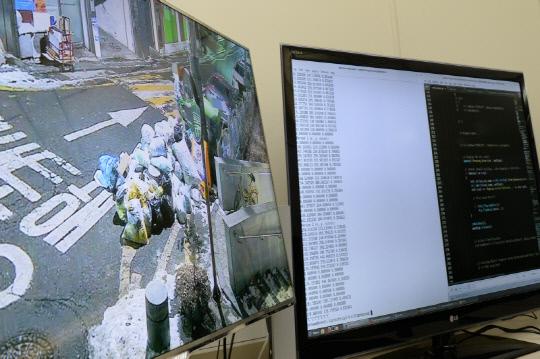 시각지능 기술을 이용한 쓰레기 투기 탐지 프로그램 동작 모습. 사진=ETRI 제공
