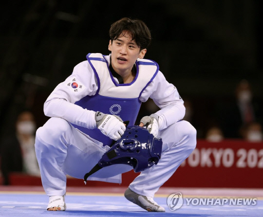 지난 25일 일본 지바 마쿠하리 메세 A홀에서 열린 2020 도쿄올림픽 태권도 남자 68㎏급 16강전에서 울루그벡 라시토프(우즈베키스탄)와 연장 승부 끝에 19-21로 패배했다. 사진=연합
